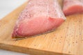 Raw Mahi Mahi Dolphin Fish Fillets on a Cutting Board Royalty Free Stock Photo