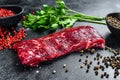 Raw marble beef meat steak. Black background. Top view Royalty Free Stock Photo