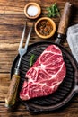 Raw marbled beef steak on grill pan Royalty Free Stock Photo