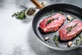 Raw marbled beef steak, top blade meat steak. Gray background. Top view. Copy space Royalty Free Stock Photo