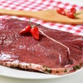 Raw marinated beef fillets Royalty Free Stock Photo