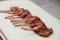 Raw marinated lamb meat