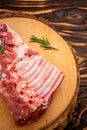 Raw marinated pork ribs ready for cooking, view from above, close-up Royalty Free Stock Photo