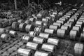 Raw material Handling: Steel coil storing inside a warehouse for exporting to automotive industry plant in black and white.