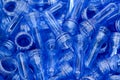 The raw material for plastic bottle blowing Royalty Free Stock Photo