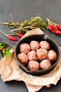 Raw meat balls vintage cast-iron pan Royalty Free Stock Photo
