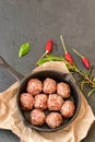 Raw meat balls vintage cast-iron pan Royalty Free Stock Photo