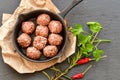 Raw meat balls vintage cast-iron pan Royalty Free Stock Photo