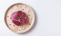 Raw meat, beef steak, on wooden board, on white background Royalty Free Stock Photo
