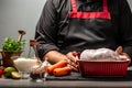 Raw meat carcass of a fresh rabbit. Hands of a chef preparing a rabbit. Food recipe background. space for text Royalty Free Stock Photo