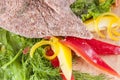Raw meat cutlet with vegetables Royalty Free Stock Photo