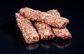 Raw meat dish in the form of rolls Royalty Free Stock Photo