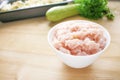 Raw meat. Fresh chicken minced ground-meat in a round white plat