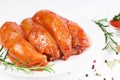 Raw meat in the marinade. Marinated Chicken Breast with spices and rosemary. Sottilissime raw fillet with spices and Royalty Free Stock Photo