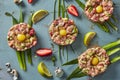 Raw meat nests with quail eggs, cucumers and strawberries Royalty Free Stock Photo