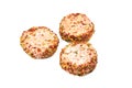 Raw meat patties with spices, three pork cutlets isolated on white