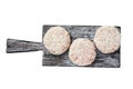 Raw meat patty cutlets with breadcrumbs Isolated on white background, top view. Royalty Free Stock Photo