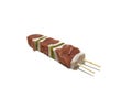 Raw meat and pepper skewers, isolated on a white background. Royalty Free Stock Photo