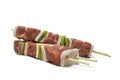 Raw meat and pepper skewers, isolated on a white background. Royalty Free Stock Photo