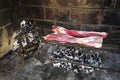 Raw meat put on the grill, traditional Argentine cuisine, Asado barbecue,