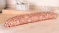 Raw meat roll over the kitchen Royalty Free Stock Photo