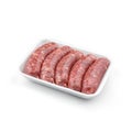 Raw meat sausages in caserola isolated on white background. Meat food, top view Royalty Free Stock Photo