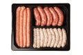 Raw meat sausages in the container on white Royalty Free Stock Photo