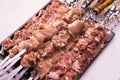 Raw meat on skewers for cooking kebabs on grill