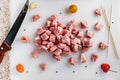 Raw meat, sliced pork steaks on kitchen  table. Meat processing. Royalty Free Stock Photo