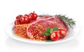 Raw meat with spice on plate Royalty Free Stock Photo