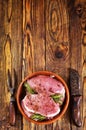 raw meat with spice on plate Royalty Free Stock Photo