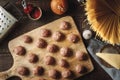 Raw meatball for spaghetti on the wooden board top view