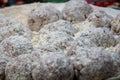 Raw meatballs coated in flour ready for frying