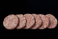 Raw meatballs is ready to be cooked. Raw Minced Beef Butcher Meatballs, Turkish name; Kasap Kofte on a black background