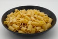 Raw Mezze Maniche Rigate, Italian Pasta. Royalty Free Stock Photo