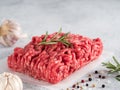 Raw minced beef on light gray cement background Royalty Free Stock Photo