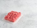 Raw minced beef on light gray cement background Royalty Free Stock Photo