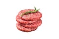 Raw minced homemade farmers grill beef burgers on chopping board with salt and rosemary. Isolated on white background. Royalty Free Stock Photo