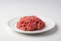 Raw minced meat pork at ceramic plate. Generate Ai Royalty Free Stock Photo