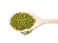 Raw mung beans with wooden spoon isolated on white, top view Royalty Free Stock Photo