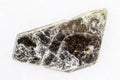 Raw muscovite common mica on white marble Royalty Free Stock Photo