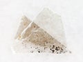 raw muscovite mica lamina on white marble Royalty Free Stock Photo