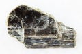 raw muscovite mica stone on white marble Royalty Free Stock Photo