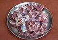 Raw mutton pieces on steel plate Royalty Free Stock Photo