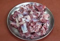 Raw mutton pieces on steel plate