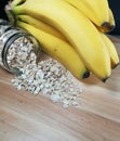 Raw oatmeal is scattered on the desk Royalty Free Stock Photo