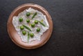 Raw olives in vintage plate