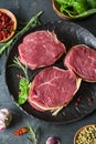 Raw organic beef steak with spices