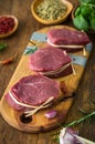 Raw organic beef steak with spices