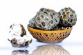 Raw organic fresh custard apple or sweet apple or sweetsop isolated on white in a basket or hamper with its reflection also. Royalty Free Stock Photo